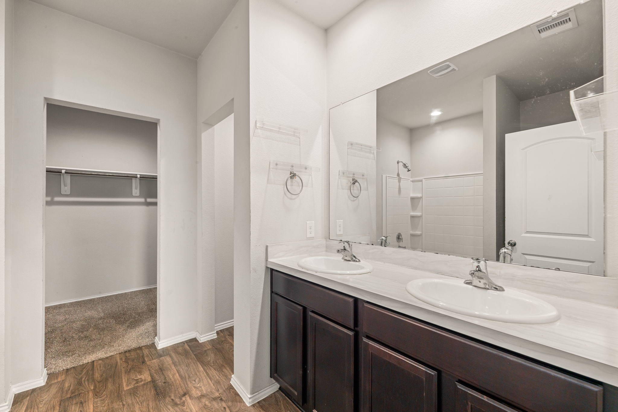 23119 Rivercane Shadow Trail Spring, TX 77373 - Photo 11 of 32 a bathroom with a sink double vanity and a mirror