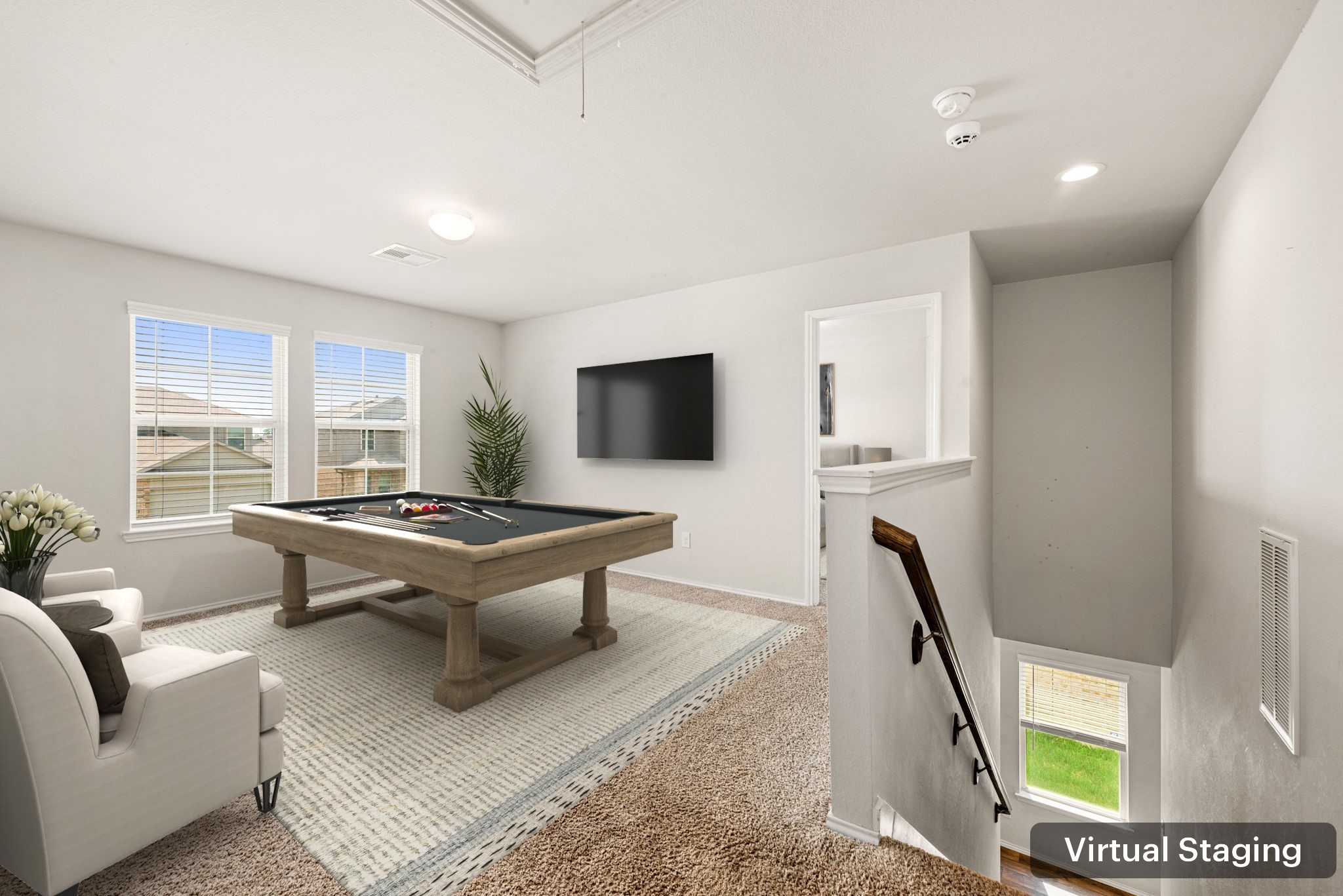 23119 Rivercane Shadow Trail Spring, TX 77373 - Photo 16 of 32 a living room with furniture rug and a flat screen tv