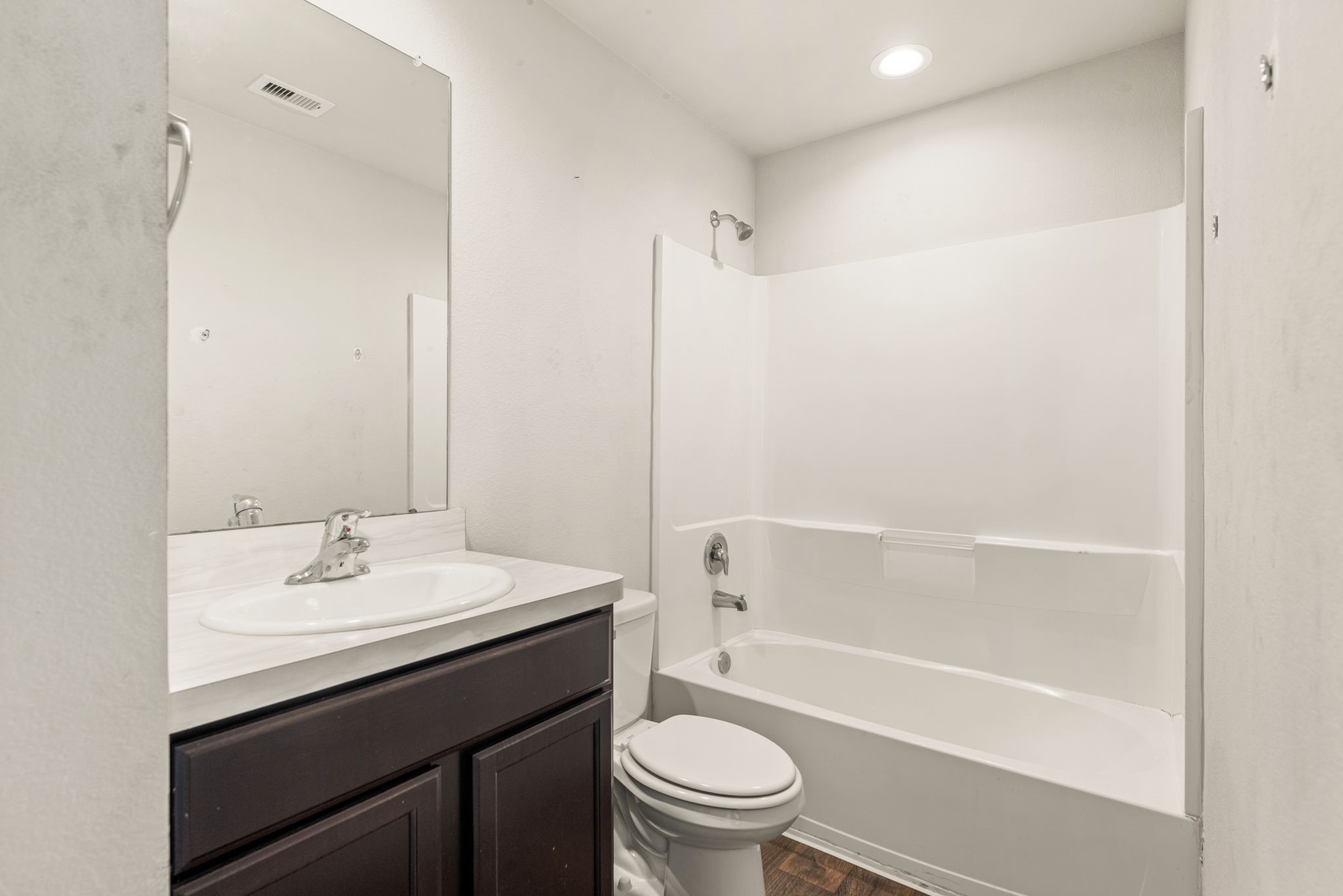 23119 Rivercane Shadow Trail Spring, TX 77373 - Photo 19 of 32 a bathroom with a sink a toilet and shower