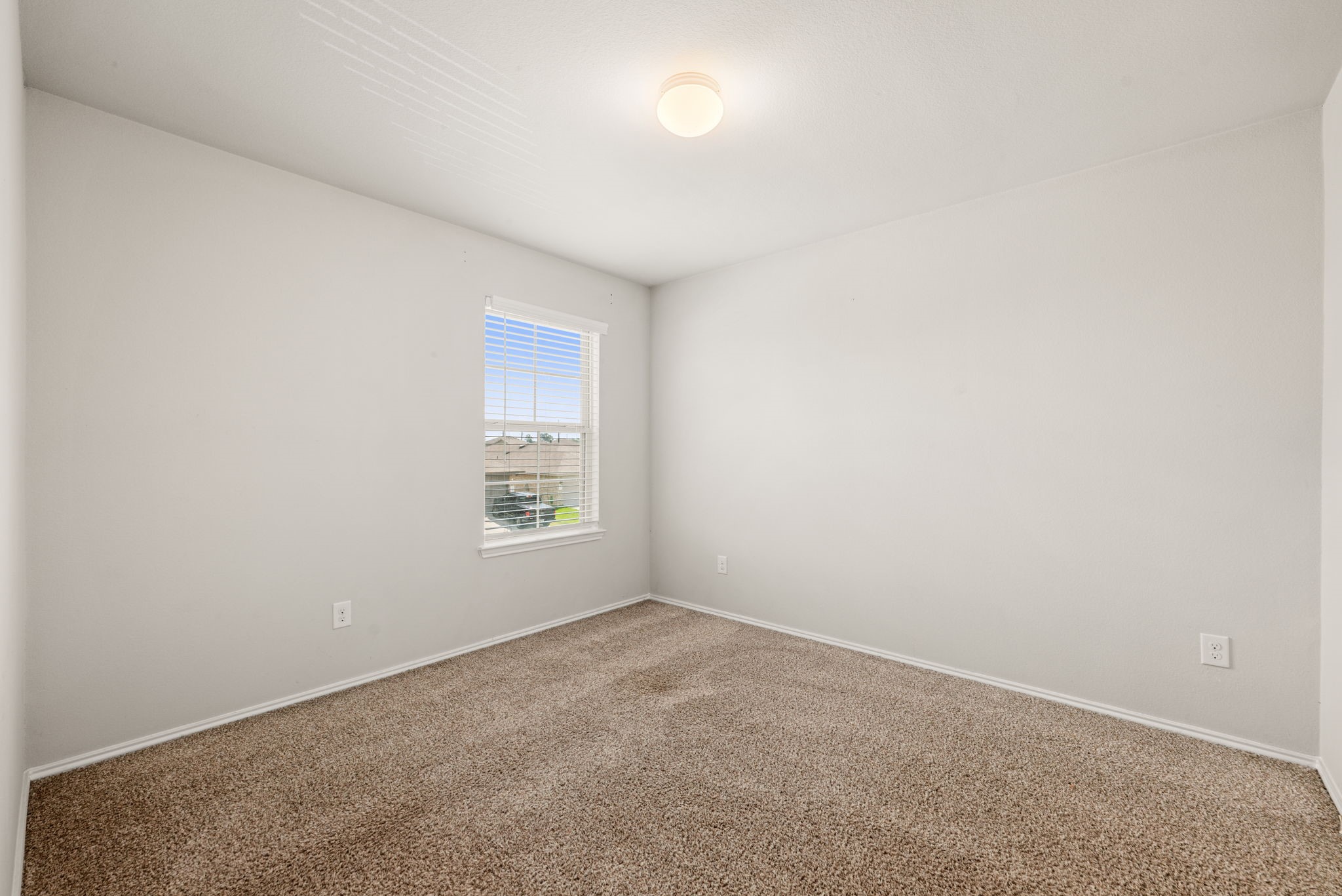 23119 Rivercane Shadow Trail Spring, TX 77373 - Photo 20 of 32 an empty room with a window