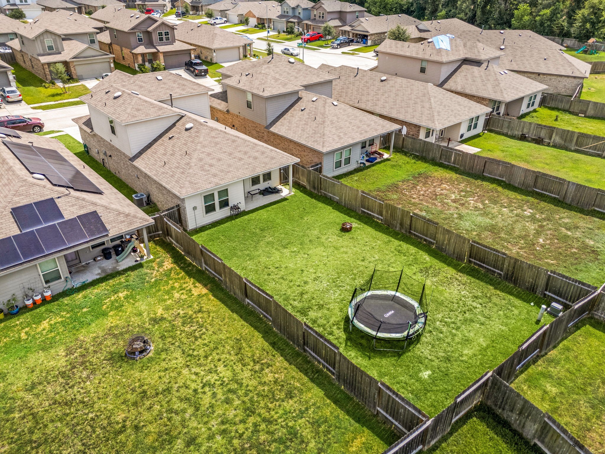 23119 Rivercane Shadow Trail Spring, TX 77373 - Photo 26 of 32 a view of a pool with chairs