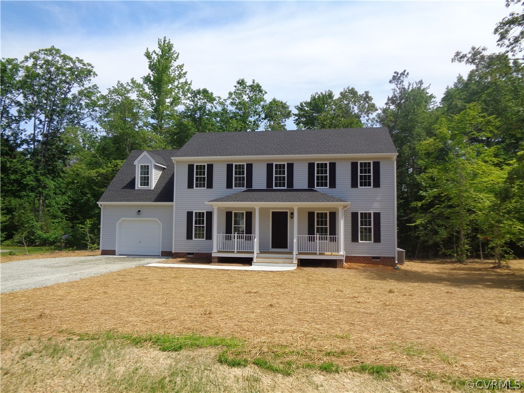 7112 Oakfork Loop New Kent, VA 23124 - Photo 1 of 21 front view of a house with a yard