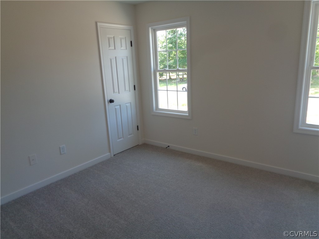 7112 Oakfork Loop New Kent, VA 23124 - Photo 16 of 21 an empty room with windows