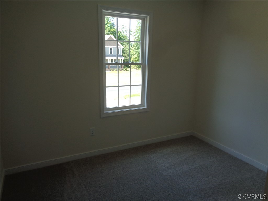 7112 Oakfork Loop New Kent, VA 23124 - Photo 17 of 21 an empty room with a window