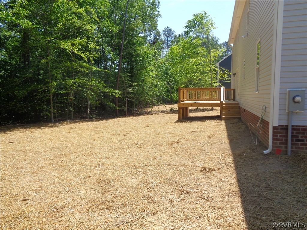 7112 Oakfork Loop New Kent, VA 23124 - Photo 21 of 21 a view of a pathway with a yard