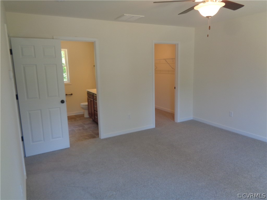 7112 Oakfork Loop New Kent, VA 23124 - Photo 10 of 21 a view of a room with a hallway