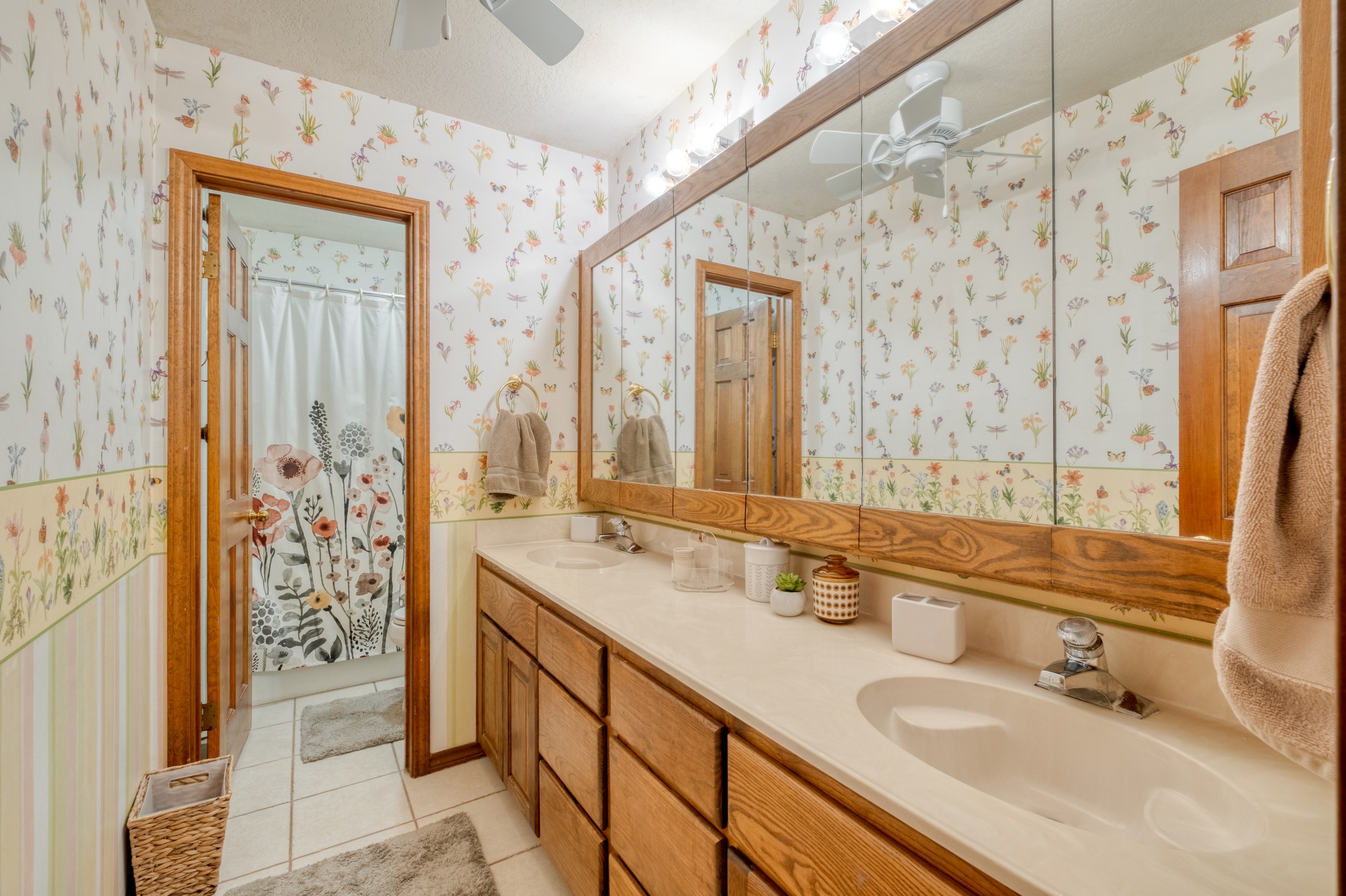 202 Ridgewood Drive Georgetown, TX 78628 - Photo 30 of 40 a bathroom with a granite countertop sink a mirror a and a shower
