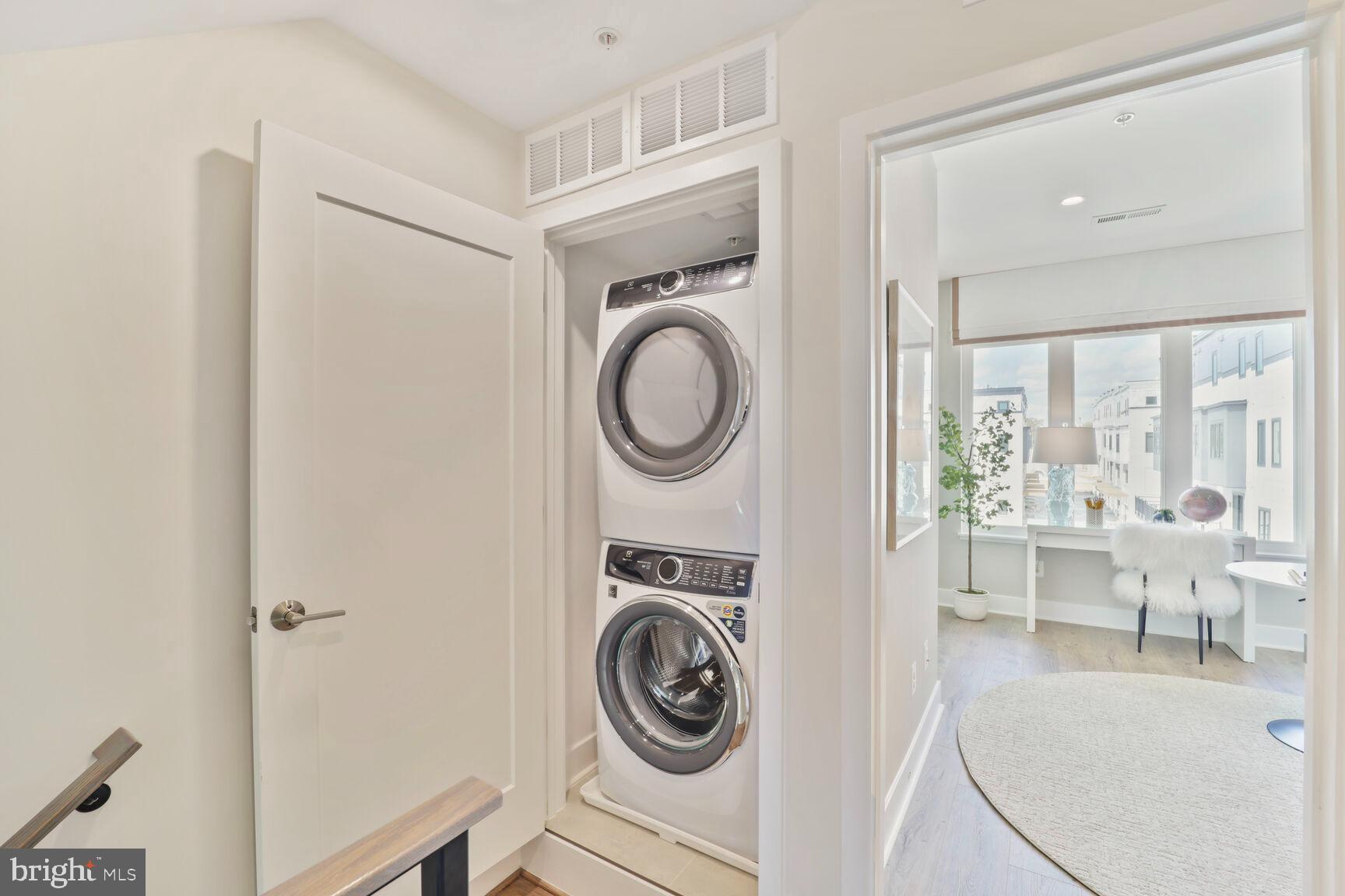 61 Lower Service Road Northwest, Unit ATWOOD 884 Washington, DC 20422 - Photo 11 of 21 a view of living room washer and dryer