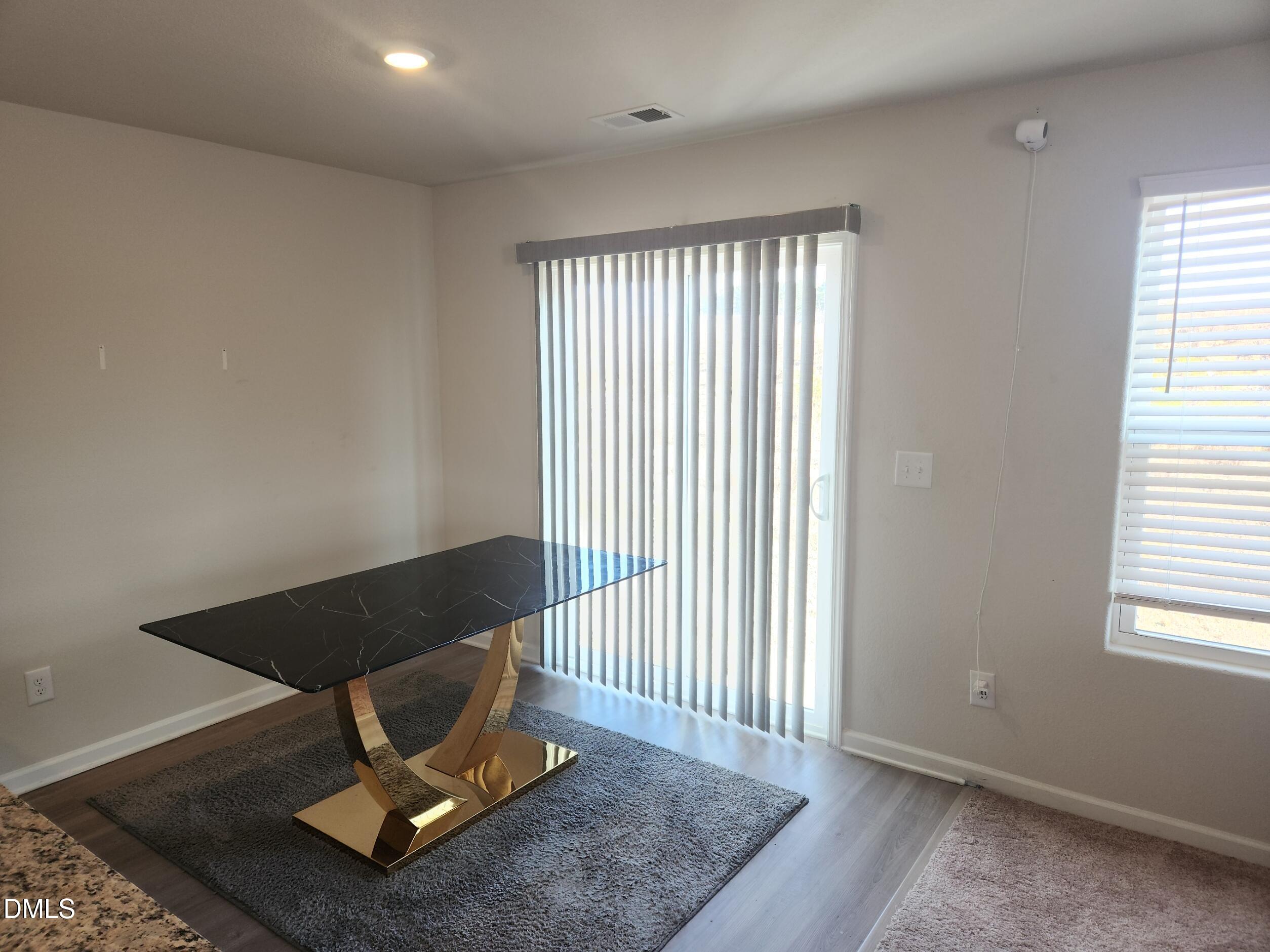 60 Coleshill Road Angier, NC 27501 - Photo 5 of 11 a living room with a couch