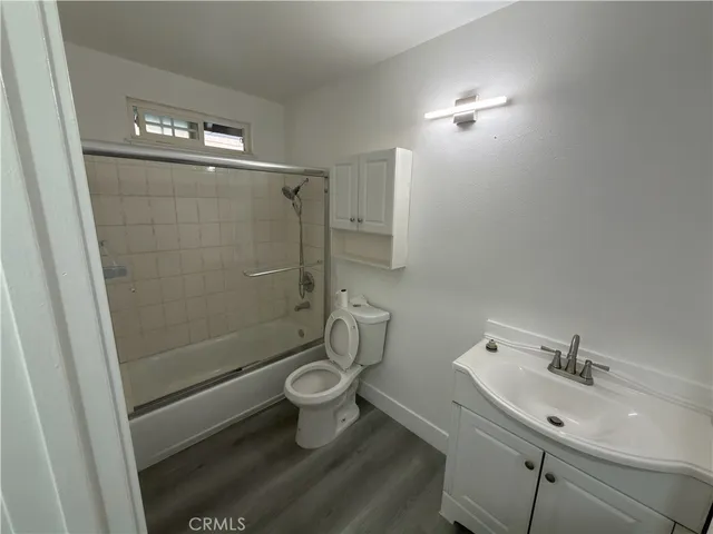 a view of a house with a yard and garage