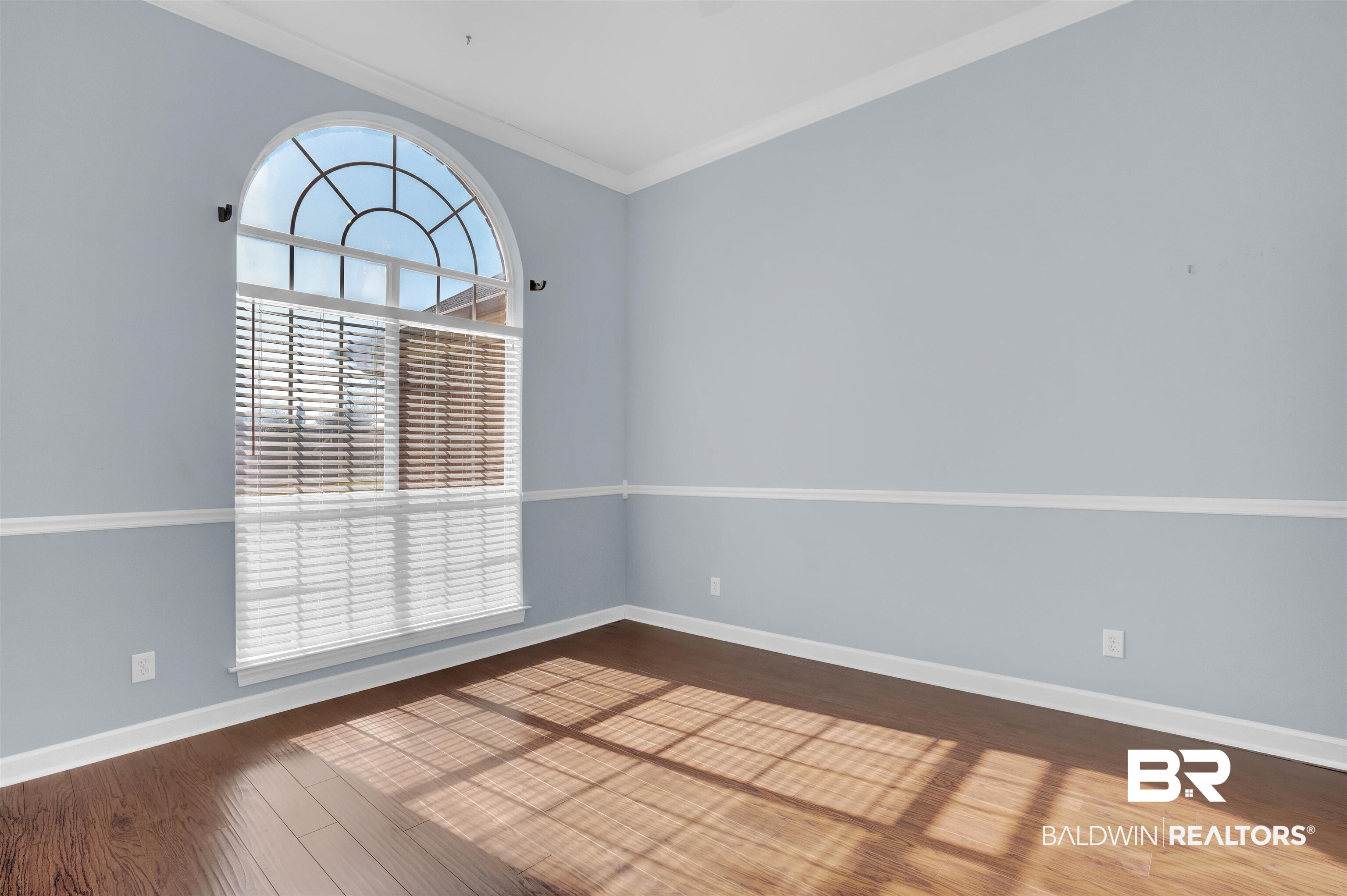 100 Conti Court Fairhope, AL 36532 - Photo 30 of 54 Unfurnished room featuring hardwood / wood-style flooring and ornamental molding