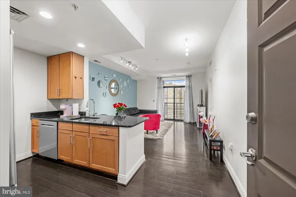 a view of a kitchen and dining room