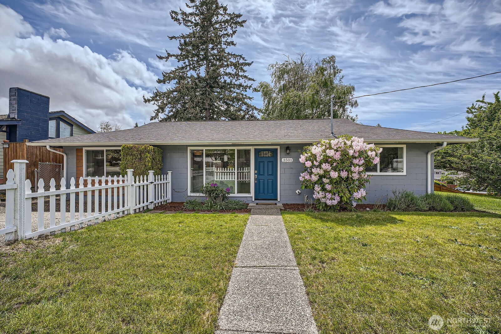 3501 Northeast 10th Street Renton, WA 98056 - Photo 1 of 28 a front view of a house with garden