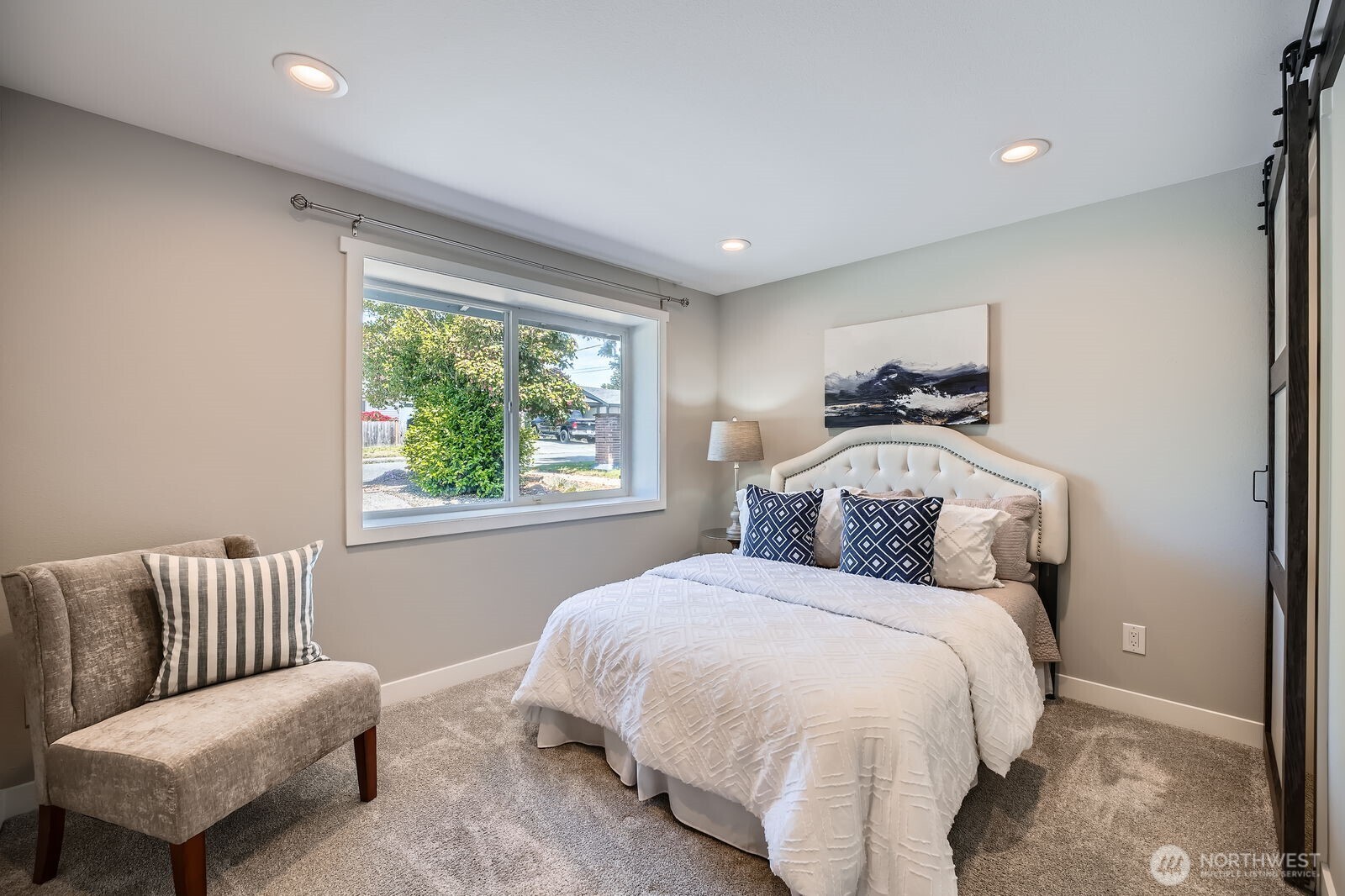 3501 Northeast 10th Street Renton, WA 98056 - Photo 16 of 28 a bedroom with a bed and window
