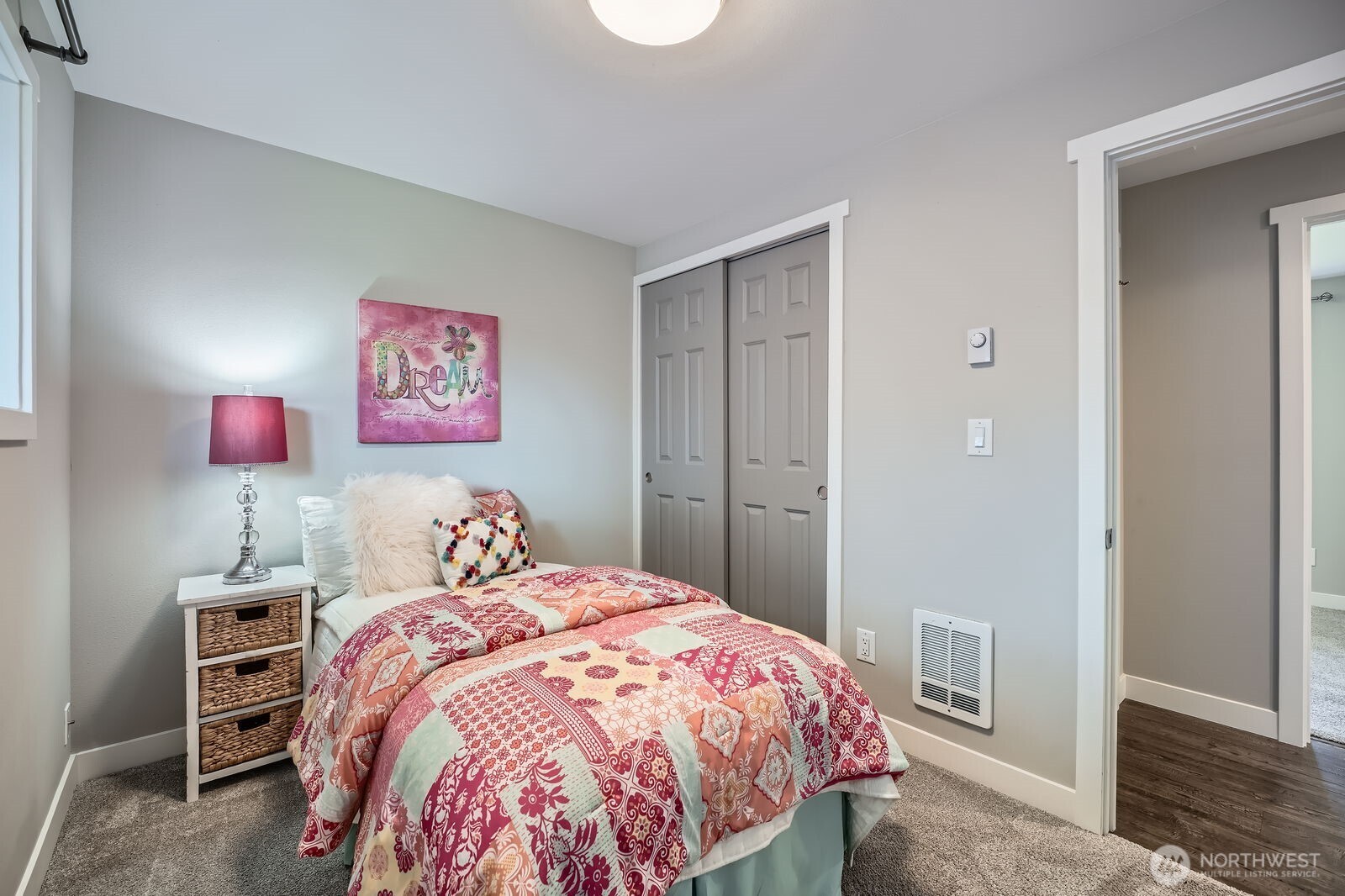 3501 Northeast 10th Street Renton, WA 98056 - Photo 23 of 28 a bedroom with a bed and a closet