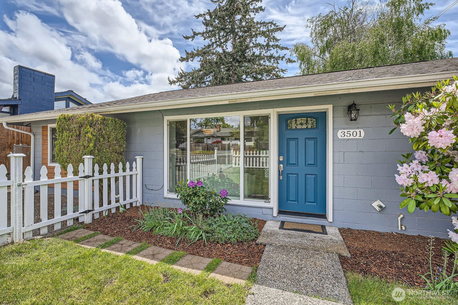 3501 Northeast 10th Street Renton, WA 98056 - Photo 3 of 28 a front view of a house having yard
