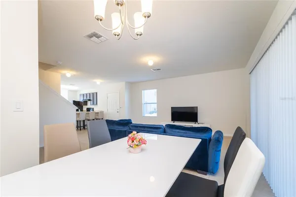 a view of a dining room with furniture
