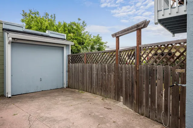 a view of a chairs and table in the patio