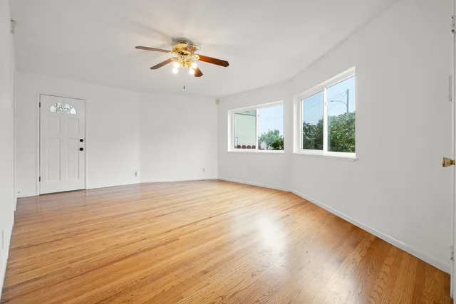 a kitchen with stainless steel appliances a stove a refrigerator and cabinets