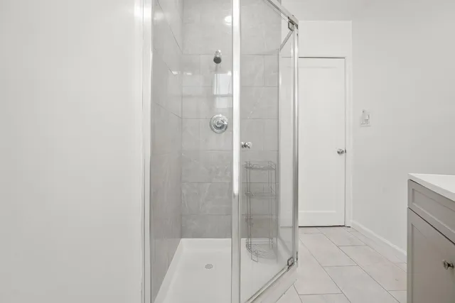 a picture of a bench in front of a door