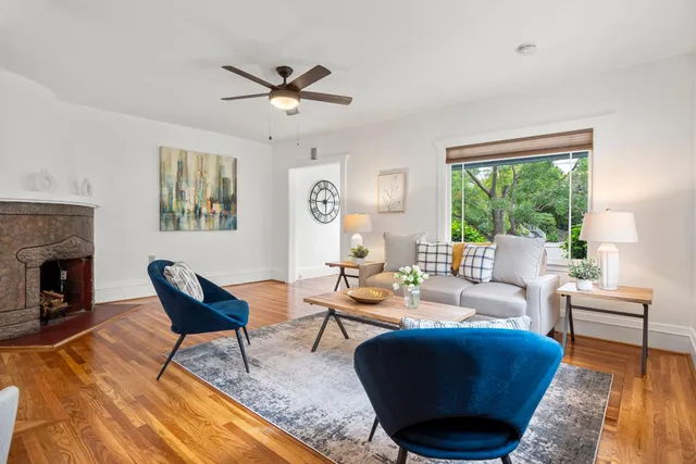 a dining room with furniture and window