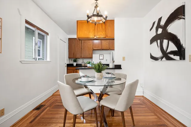 a kitchen with stainless steel appliances granite countertop sink stove top oven and cabinets