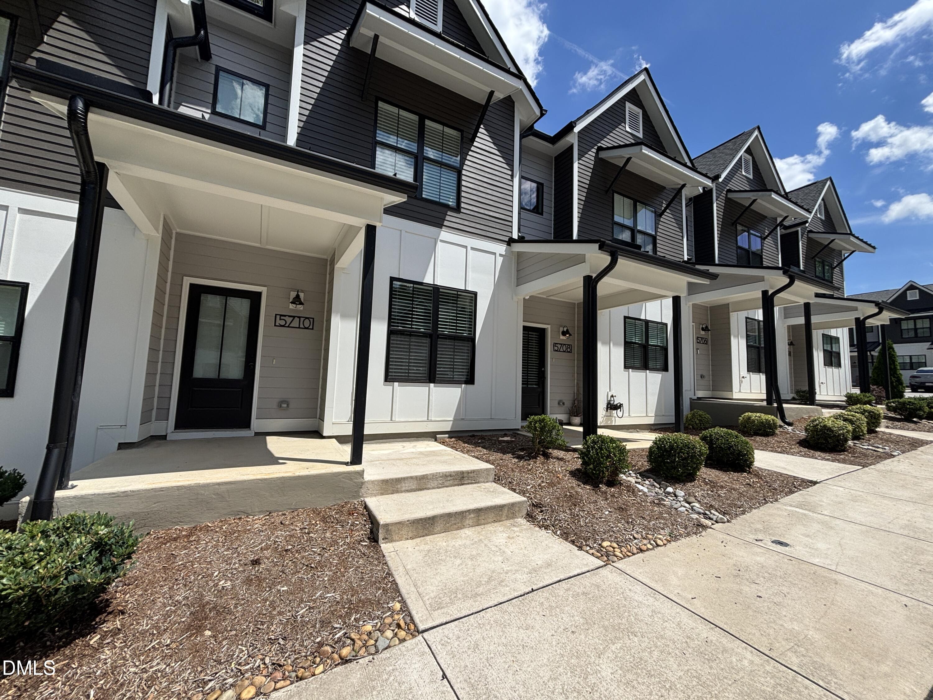 5710 Parker Pnes Court Raleigh, NC 27609 - Photo 7 of 78 a front view of a building