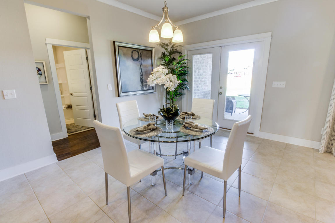 329 Merlin Court Crestview, FL 32539 - Photo 5 of 16 a dining room with furniture and window
