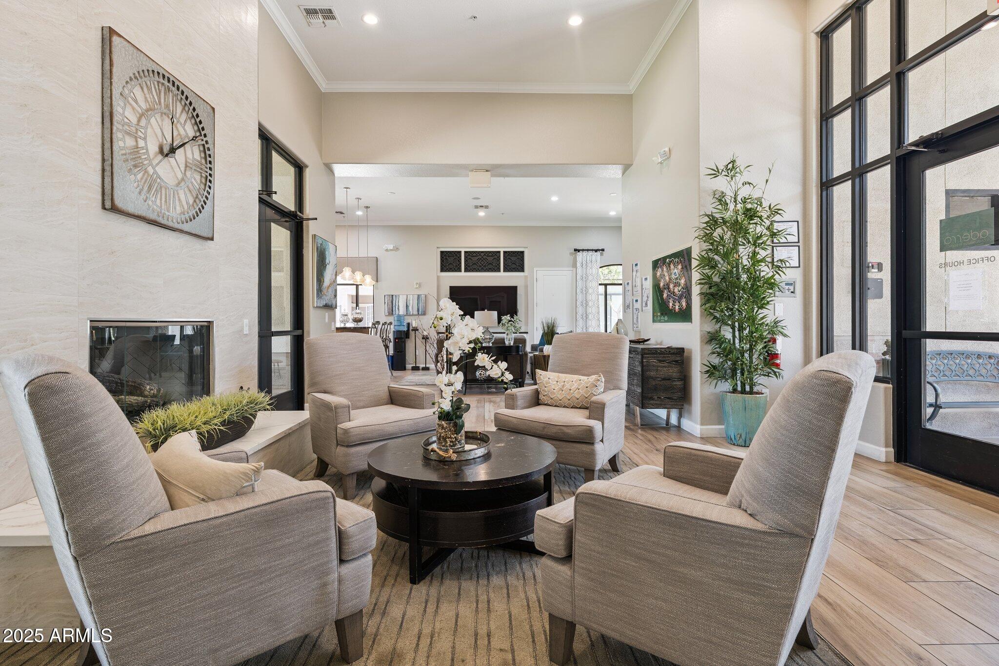 11640 North Tatum Boulevard, Unit 2079 Phoenix, AZ 85028 - Photo 9 of 48 a living room with fireplace furniture and a large window