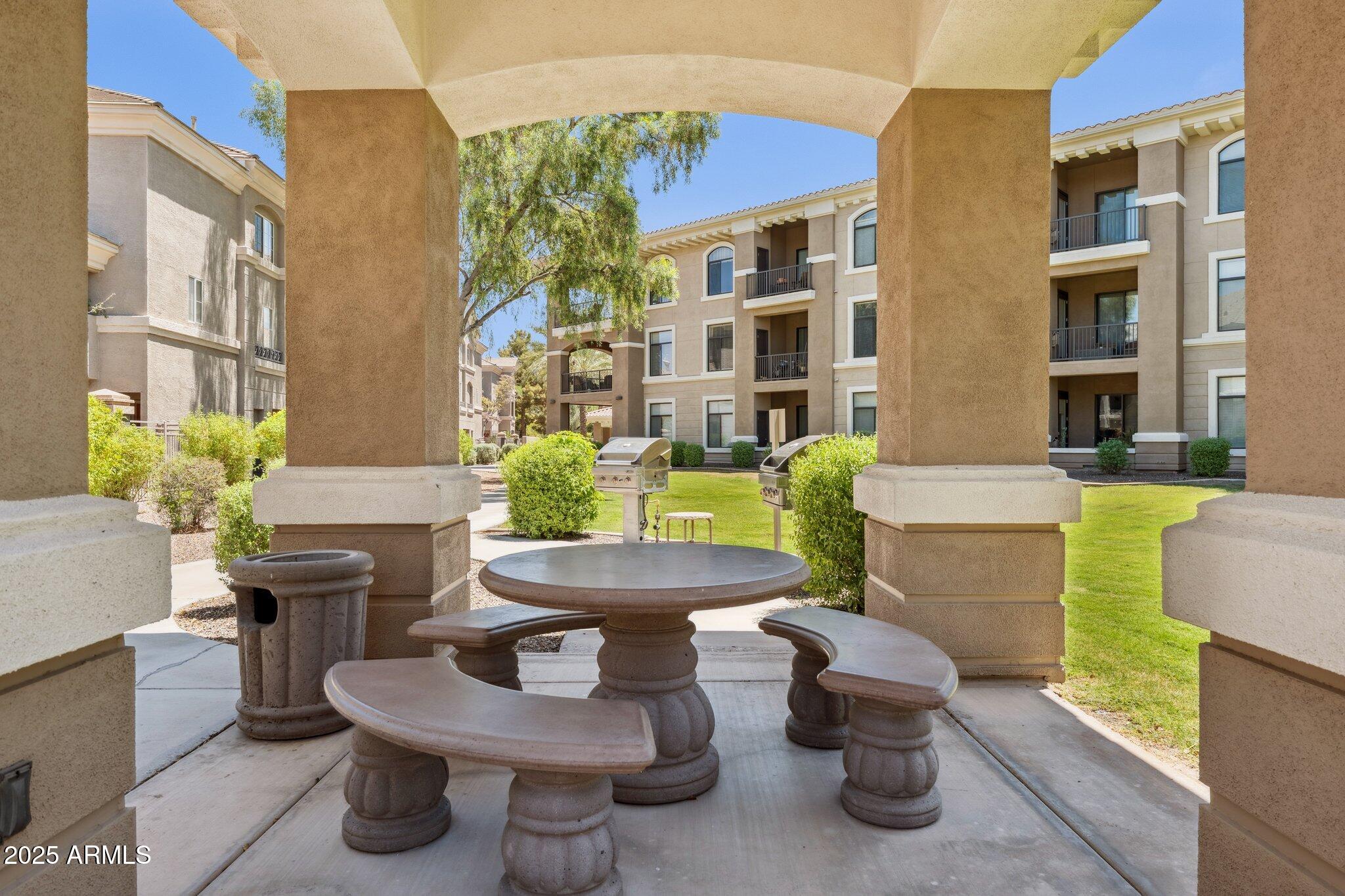 11640 North Tatum Boulevard, Unit 2079 Phoenix, AZ 85028 - Photo 11 of 48 a outdoor space with patio furniture and potted plants