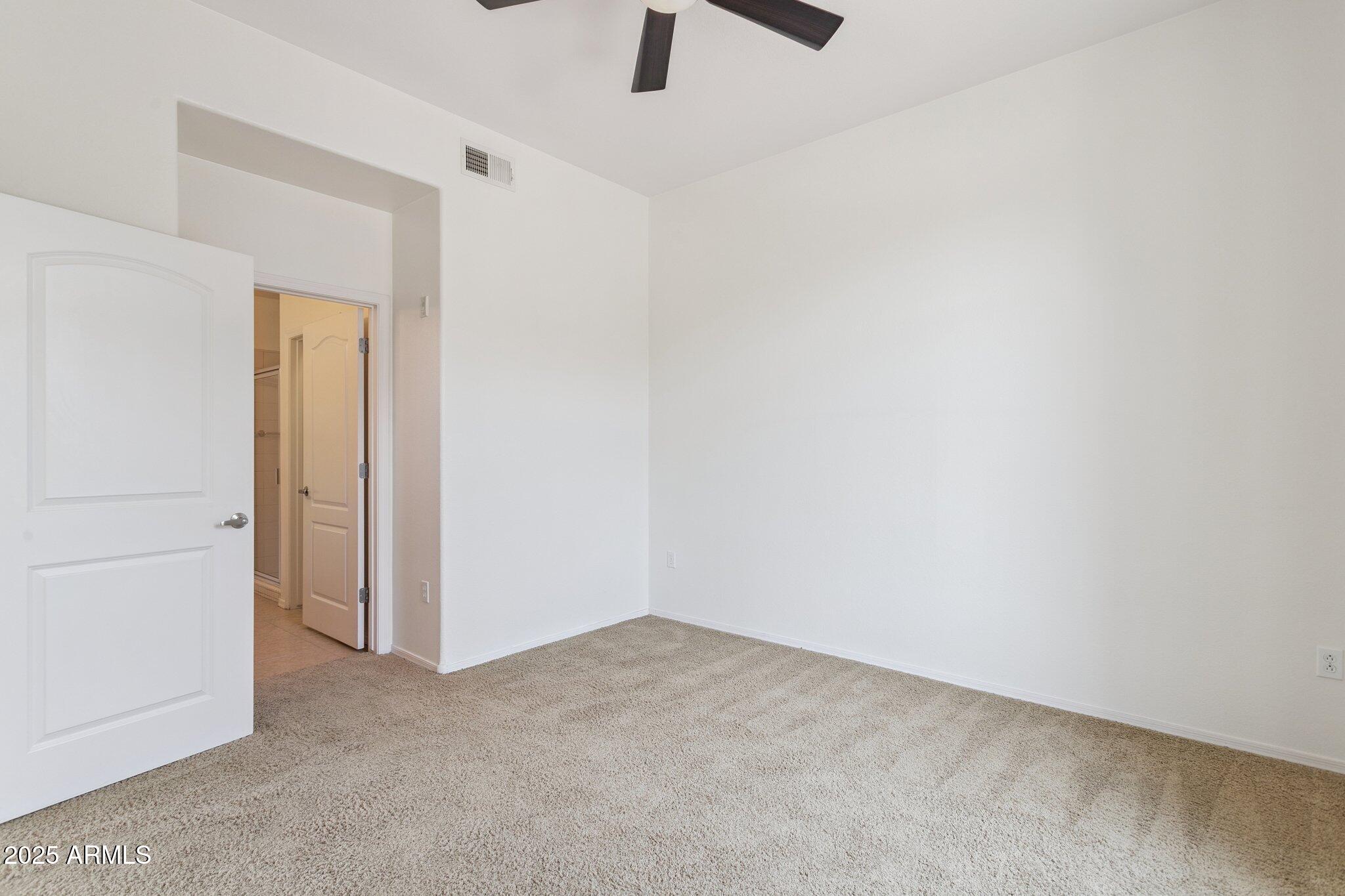 11640 North Tatum Boulevard, Unit 2079 Phoenix, AZ 85028 - Photo 21 of 48 a view of an empty room