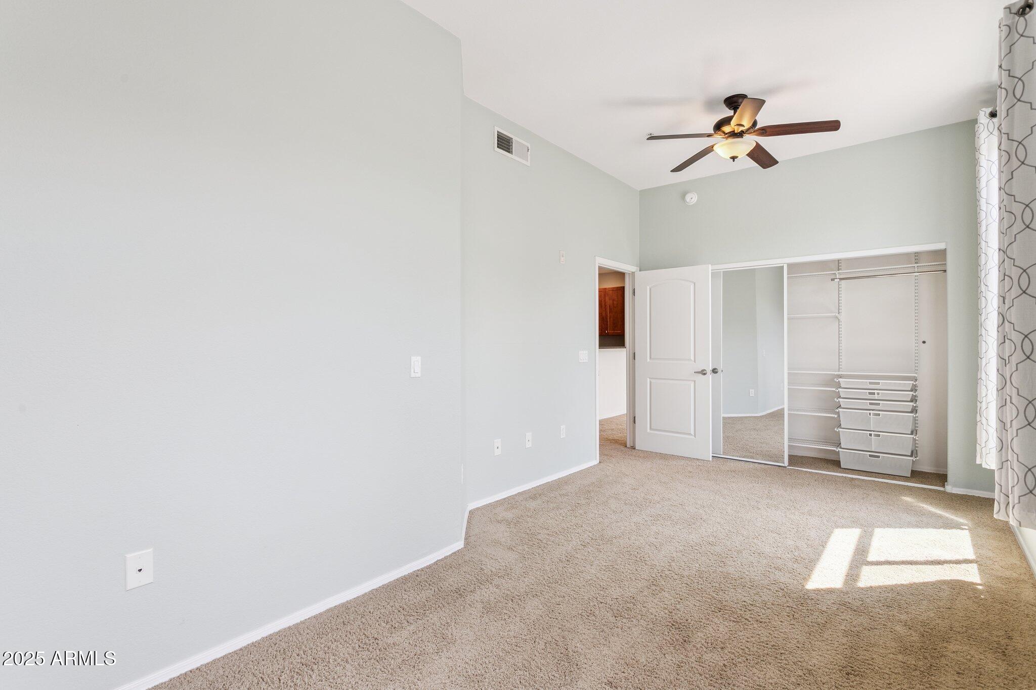 11640 North Tatum Boulevard, Unit 2079 Phoenix, AZ 85028 - Photo 28 of 48 a view of empty room with windows