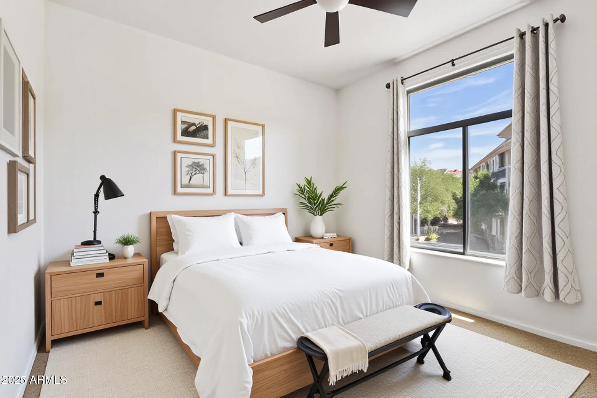 11640 North Tatum Boulevard, Unit 2079 Phoenix, AZ 85028 - Photo 2 of 48 a bedroom with a bed and a large window