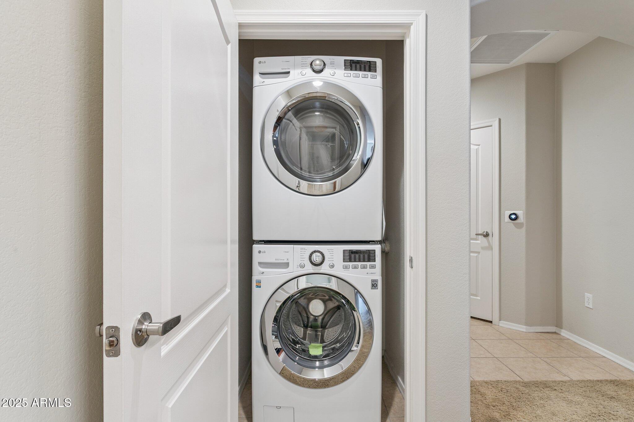 11640 North Tatum Boulevard, Unit 2079 Phoenix, AZ 85028 - Photo 31 of 48 a utility room with dryer and washer