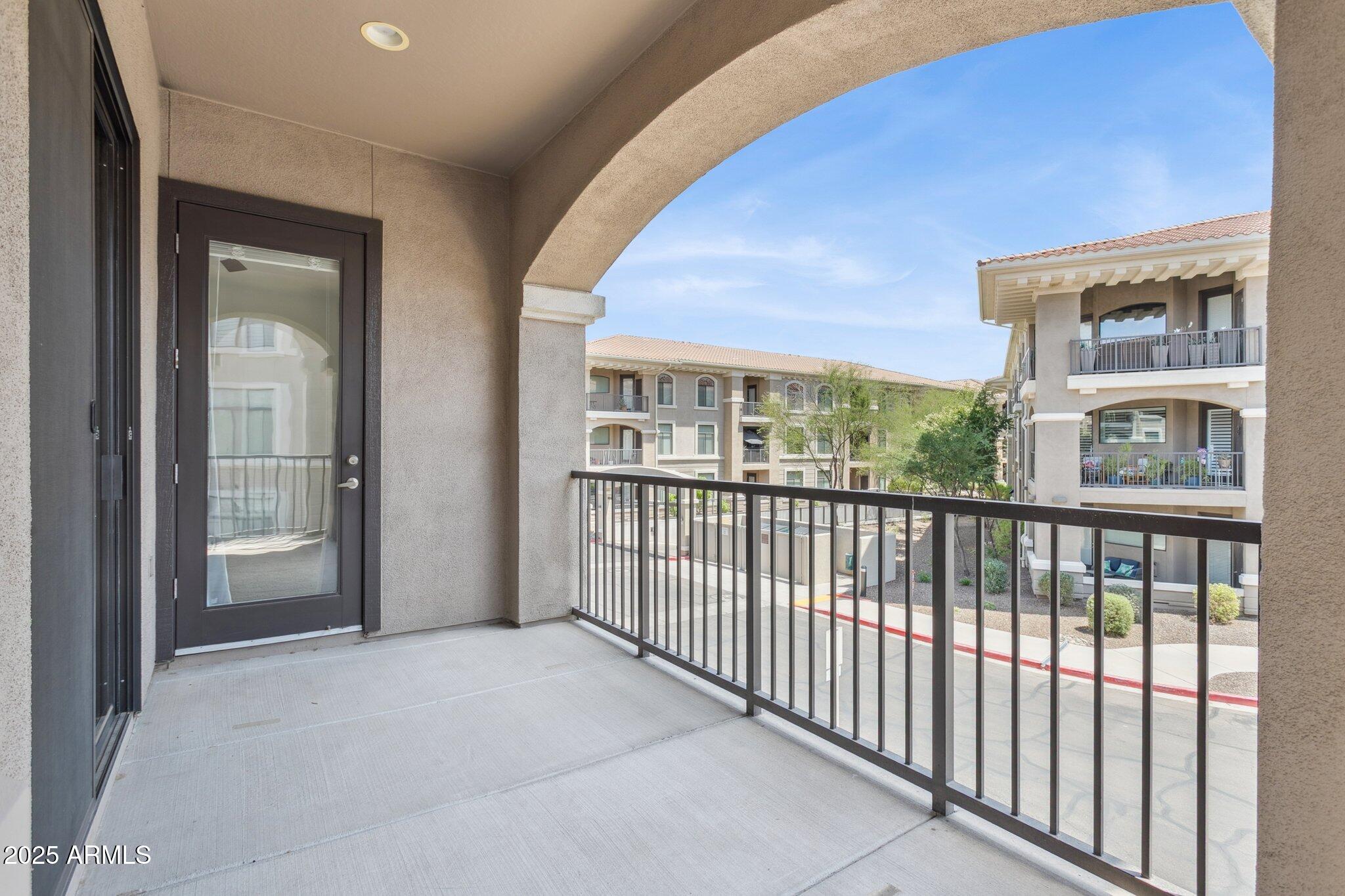 11640 North Tatum Boulevard, Unit 2079 Phoenix, AZ 85028 - Photo 33 of 48 a view of a building from a balcony