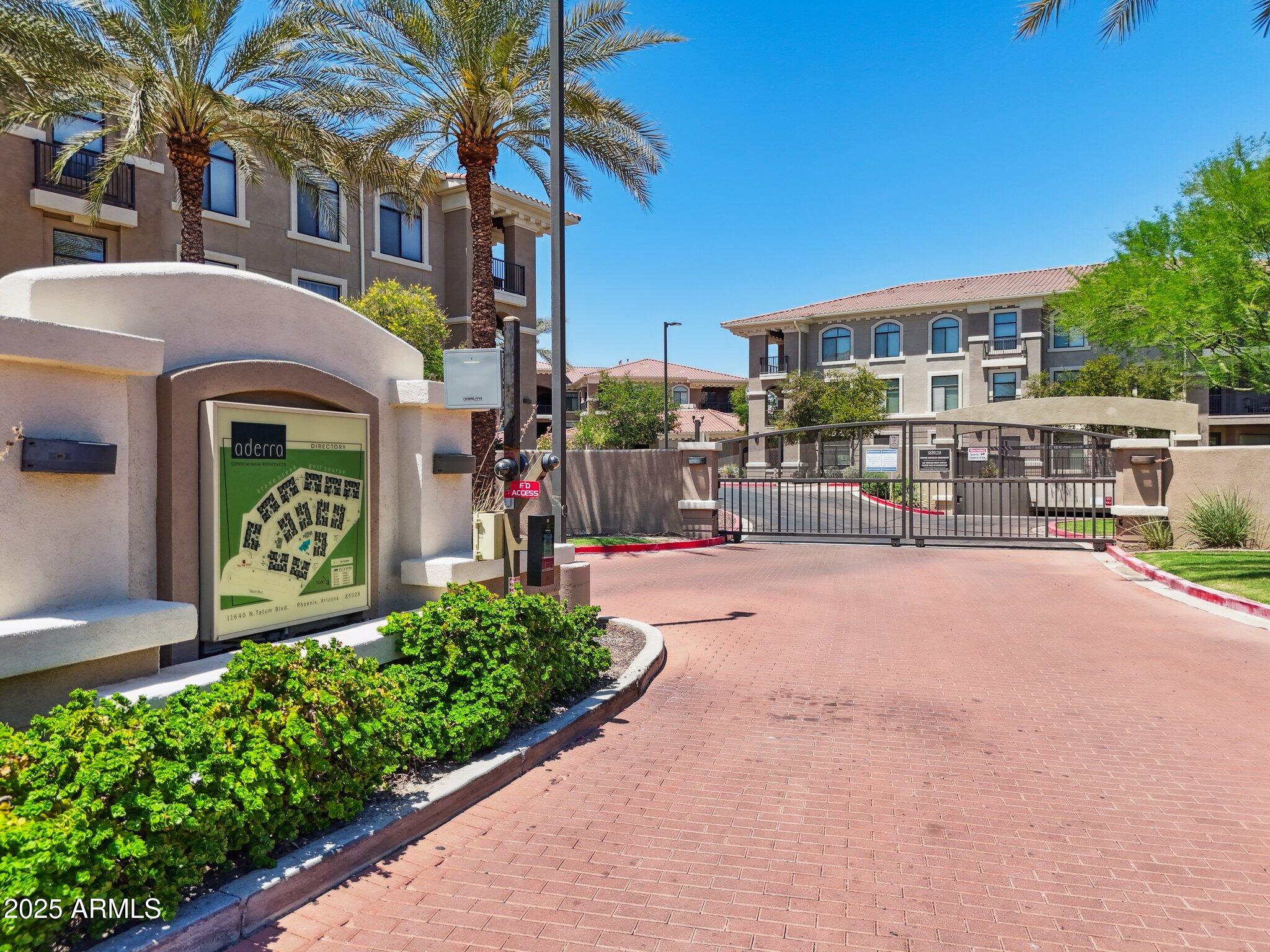 11640 North Tatum Boulevard, Unit 2079 Phoenix, AZ 85028 - Photo 35 of 48 a front view of a building with garden