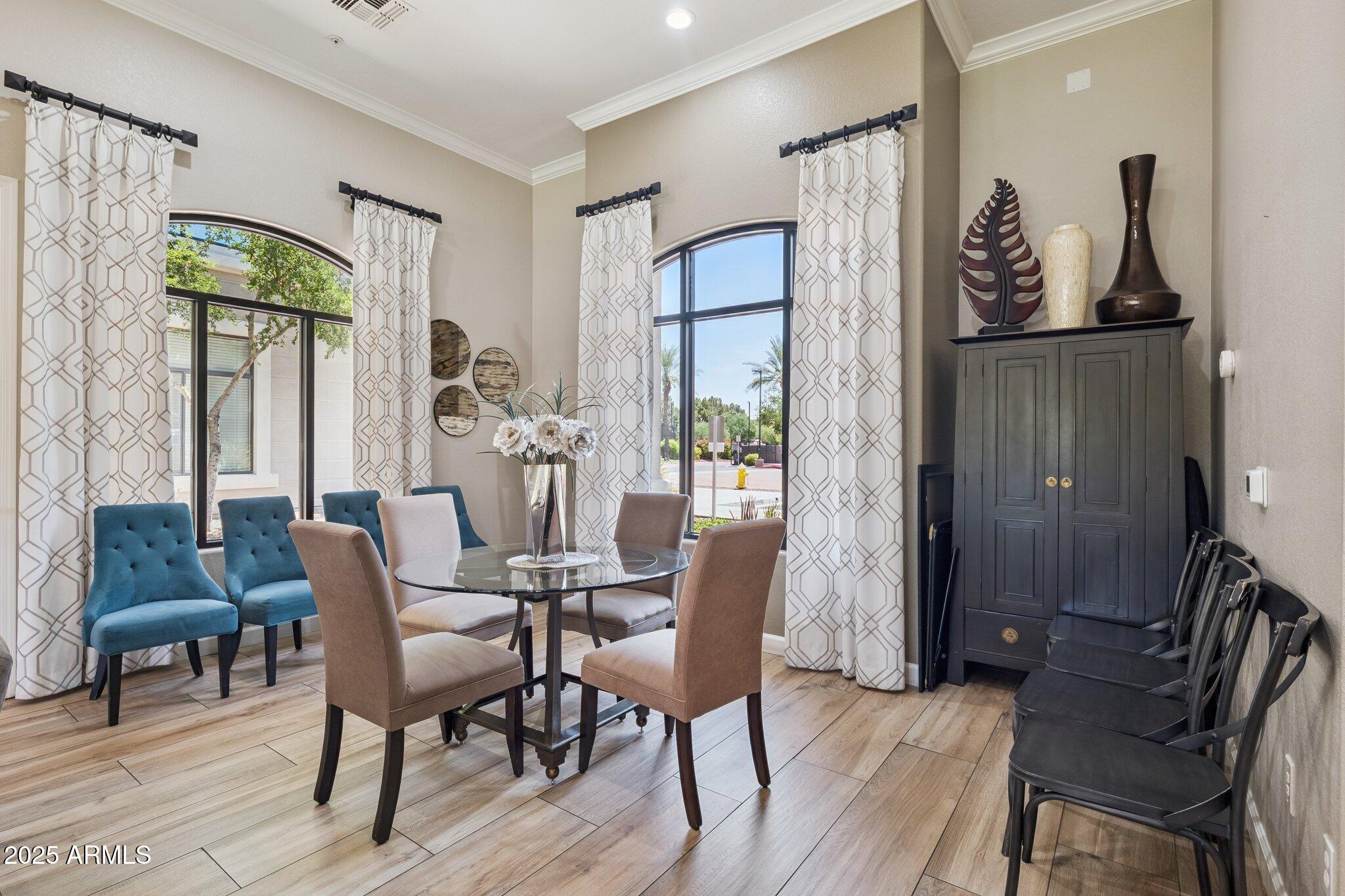 11640 North Tatum Boulevard, Unit 2079 Phoenix, AZ 85028 - Photo 38 of 48 a dining room with furniture and window