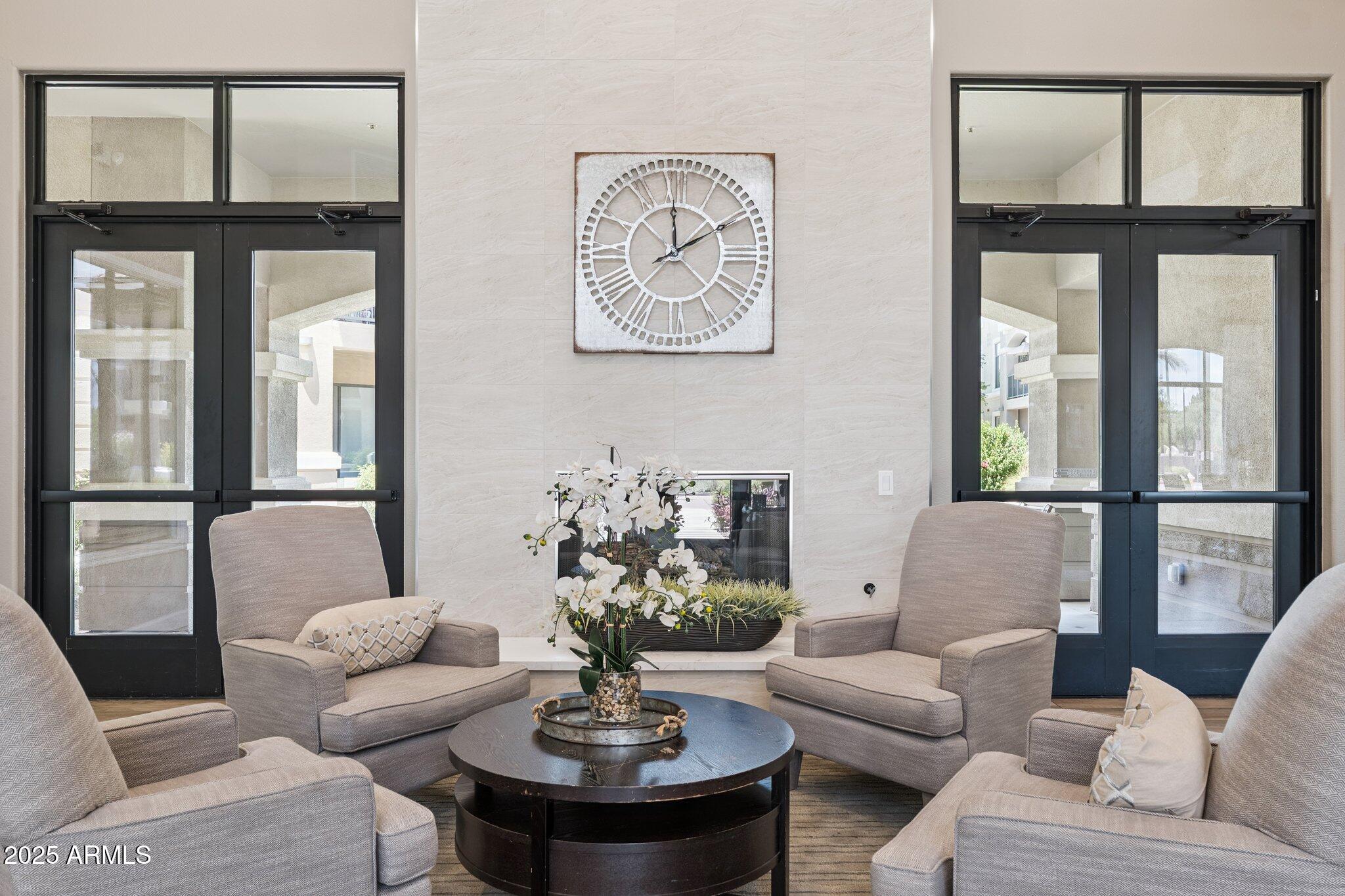 11640 North Tatum Boulevard, Unit 2079 Phoenix, AZ 85028 - Photo 40 of 48 a living room with furniture and a large window