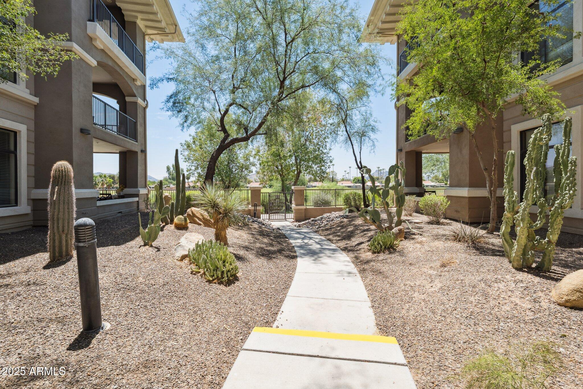 11640 North Tatum Boulevard, Unit 2079 Phoenix, AZ 85028 - Photo 43 of 48 a view of a backyard with sitting area