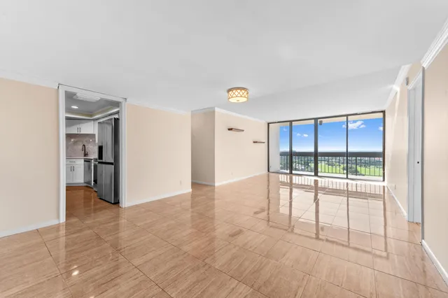 a view of an empty room and window