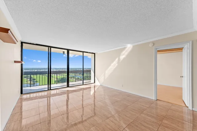 a view of an empty room and window