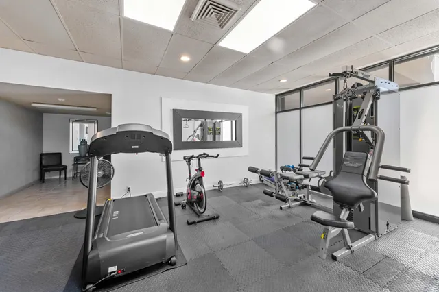 a view of a swimming pool with a yard