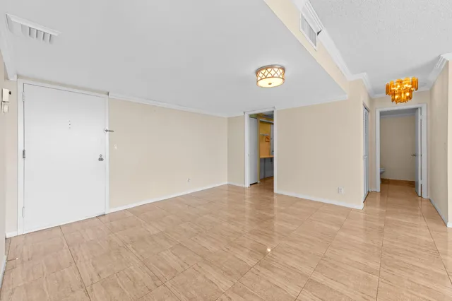 a view of an empty room and window