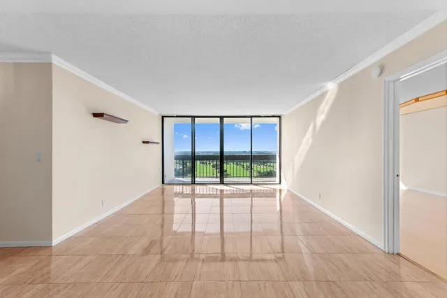 a view of an empty room and window