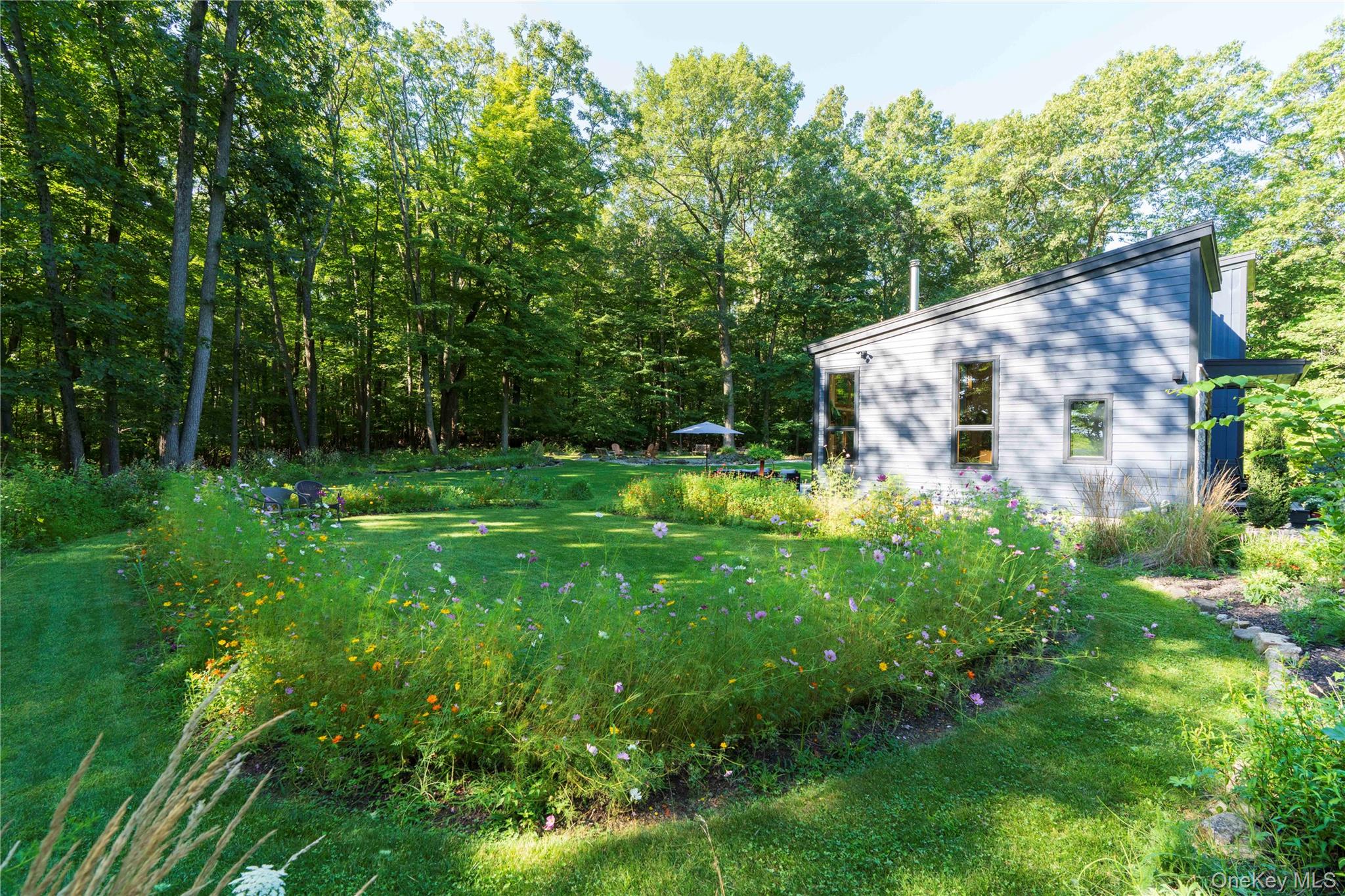 105 Iron Mountain Road Warwick, NY 10990 - Photo 11 of 49 View of House with the Perennial Flower Gardens
