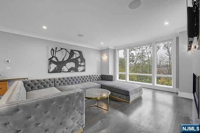 1234 River Road Edgewater, NJ 07020 - Photo 12 of 29 a living room with furniture and a large window with outer view