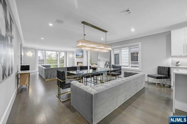 1234 River Road Edgewater, NJ 07020 - Photo 13 of 29 a view of a dining room with furniture window and wooden floor