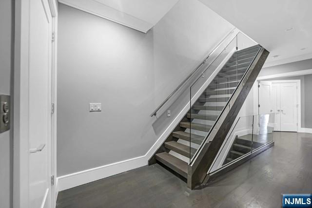 1234 River Road Edgewater, NJ 07020 - Photo 16 of 29 a view of a hallway with staircase