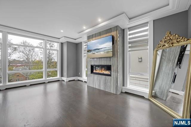 1234 River Road Edgewater, NJ 07020 - Photo 22 of 29 a view of an empty room with a window and wooden floor