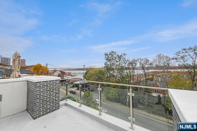 1234 River Road Edgewater, NJ 07020 - Photo 24 of 29 a view of a balcony with city
